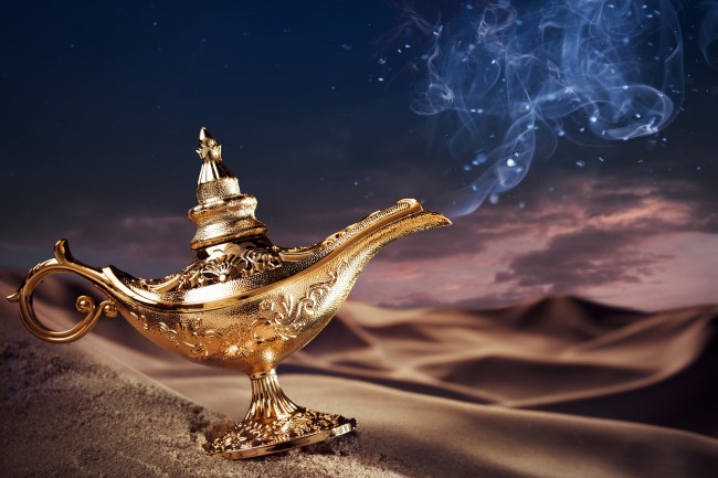Magic Aladdin's Genie lamp on a desert