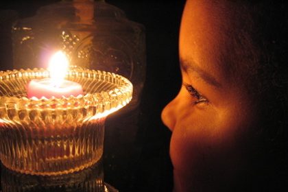 child-with-candle